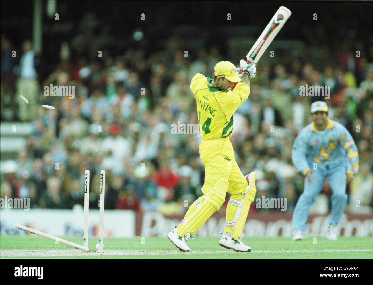Australia's Ricky Ponting is clean bowled by India's Robin Singh Stock Photo