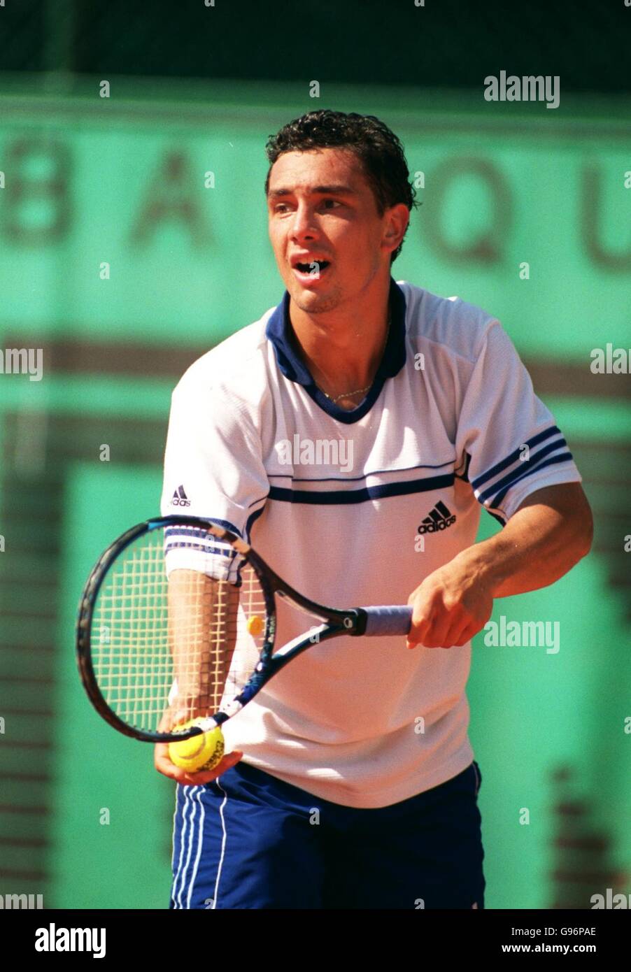 Tennis - French Open - Men's Singles - First Round - Mariano Puerta v  Gianluca Pozzi Stock Photo - Alamy