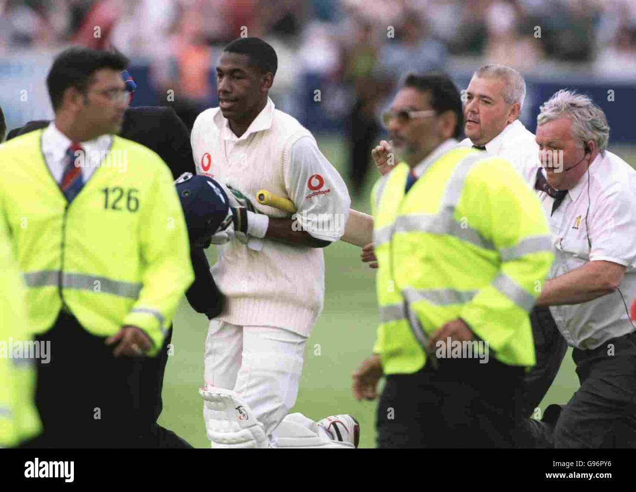 Cricket - First Test - England v New Zealand - Third Day. England's Alex Tudor is escorted off the field after his match winning innings of 99 not out Stock Photo