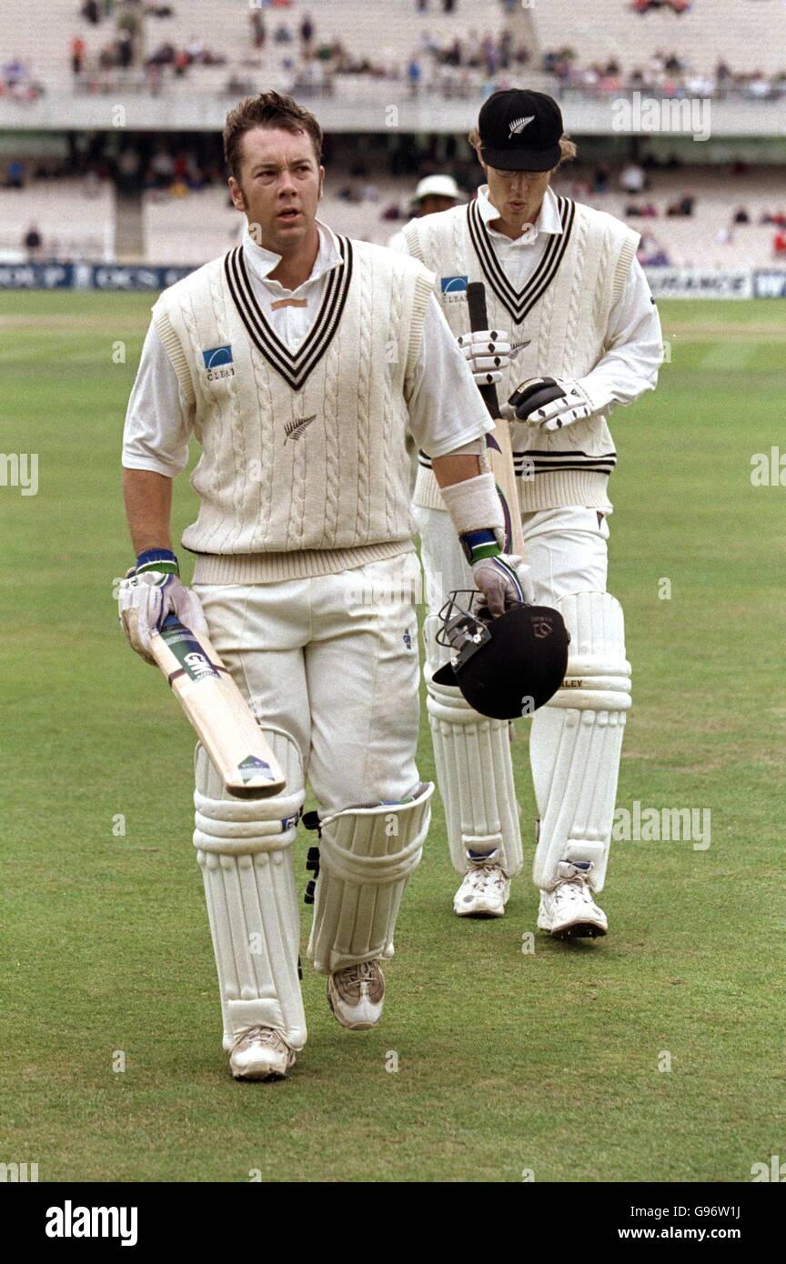 New Zealand's Craig McMillan (left) walks off at lunch undefeated with 107 taking New Zealand to a total of 496 for 9. Pictured walking off with Daniel Vettori (right). Stock Photo