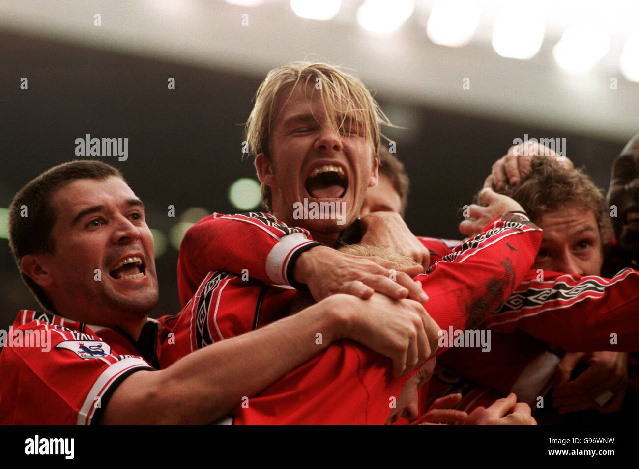 Manchester United's Roy Keane (left) and David Beckham (centre) celebrate the winning goal, scored by Ole Gunnar Solskjaer (right) Stock Photo