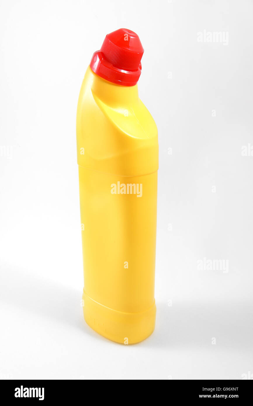 Yellow plastic bleach bottle studio shot on white background not