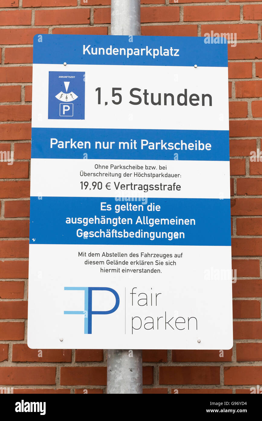 Park signs to customer parking, Germany Stock Photo