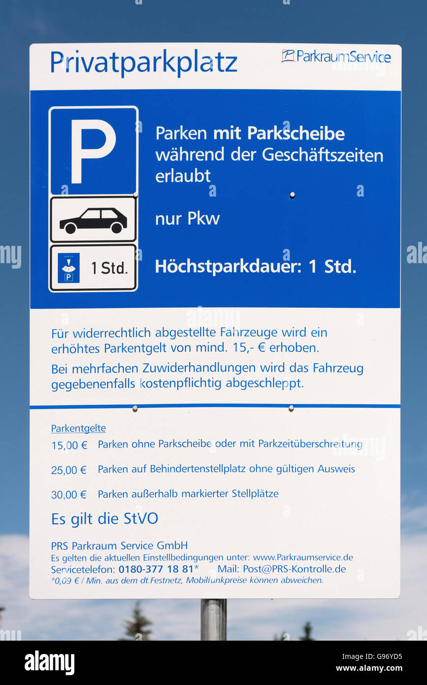 Park signs to customer parking, Germany Stock Photo