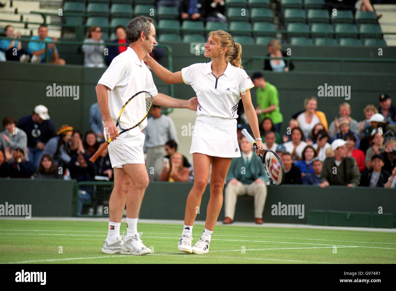 Tennis - Wimbledon, Mixed Doubles-McEnroe and Graf v Coetzee and Melicharova Stock Photo