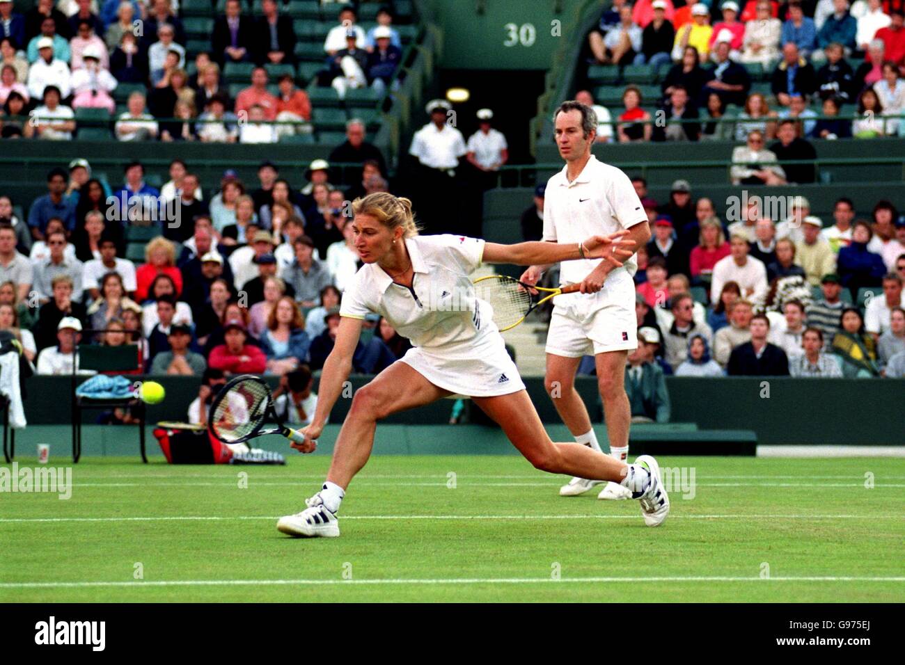 Tennis - Wimbledon Championships - Mixed Doubles - First Round - John  McEnroe and Steffi Graf v Jeff Coetzee and Eva Melicharova Stock Photo -  Alamy