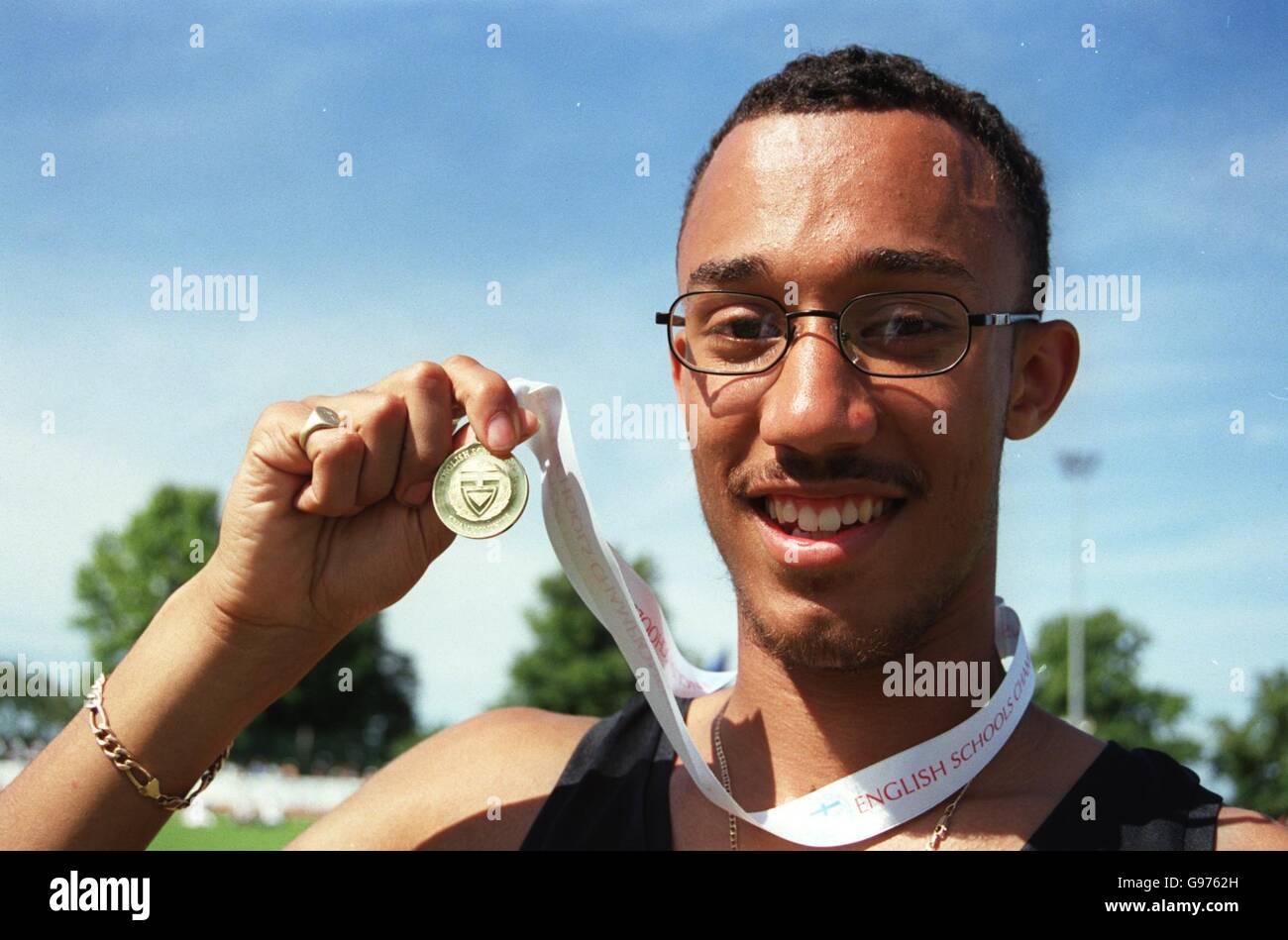 Chris Lambert, 18, from Lewisham, London, with his gold medal for the Senior Boys' 200m Stock Photo