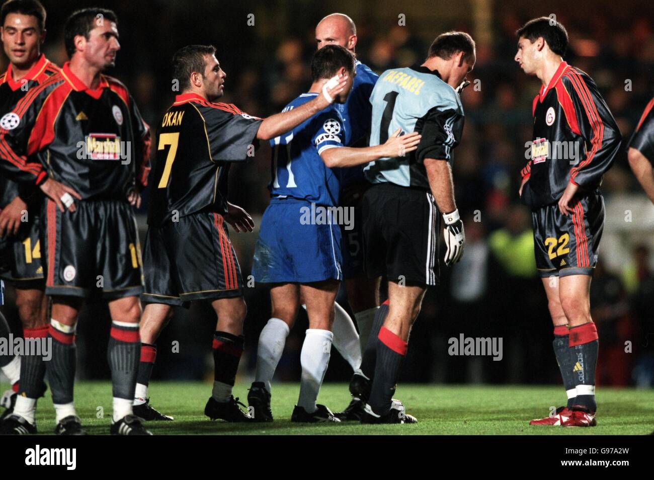 Galatasaray players try to comfort goalkeeper Claudio Andre Taffarel as he is sent off Stock Photo