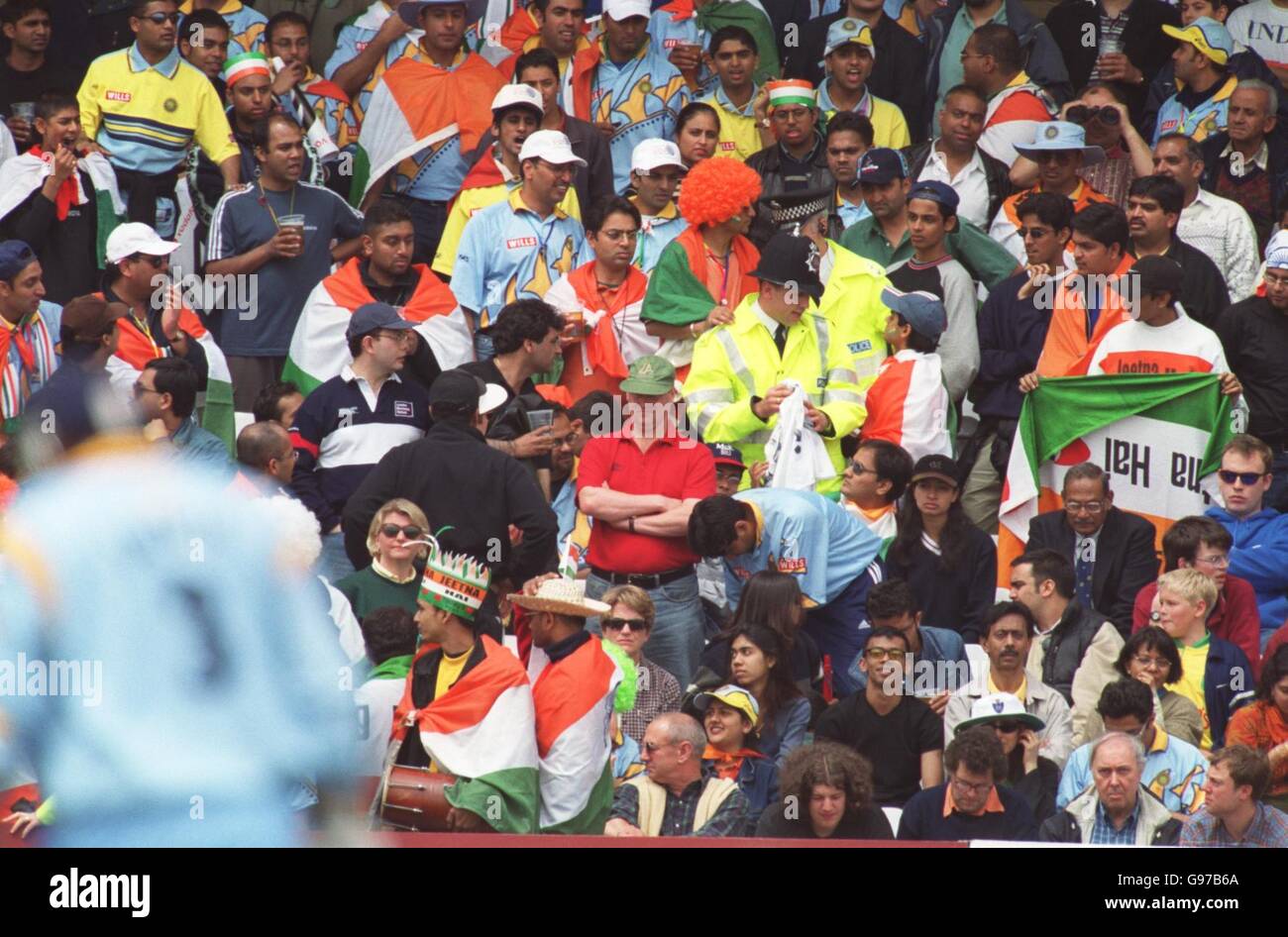 The police make their presence felt amongst the India fans Stock Photo
