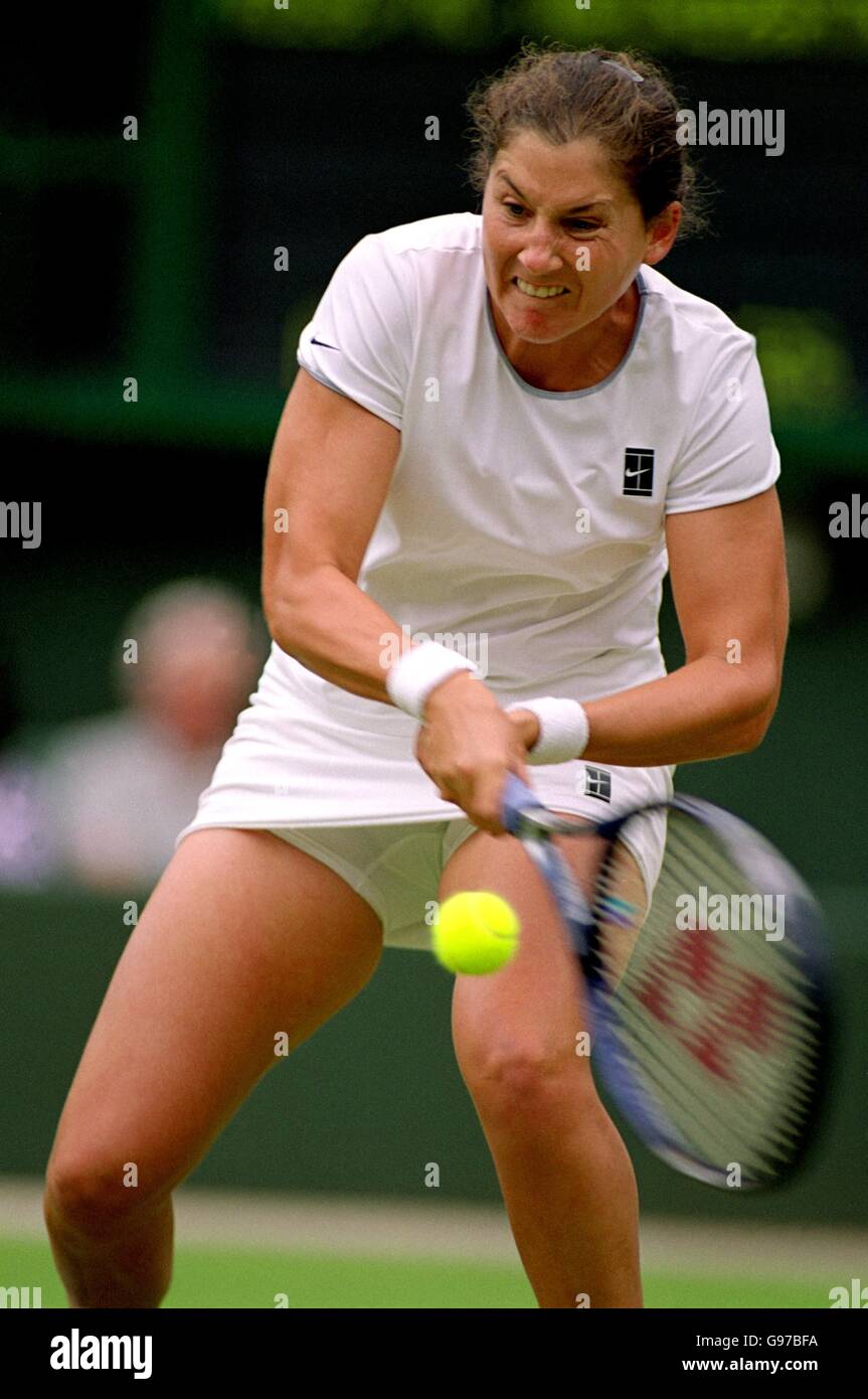 Tennis Wimbledon. Monica Seles in action against Marlene Weingartner