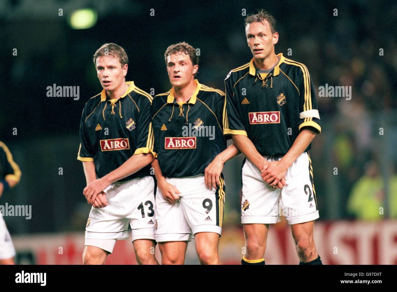 AIK Solna's defensive wall (l-r): Christer Mattiasson, Hans Bergh, Krister Nordin Stock Photo