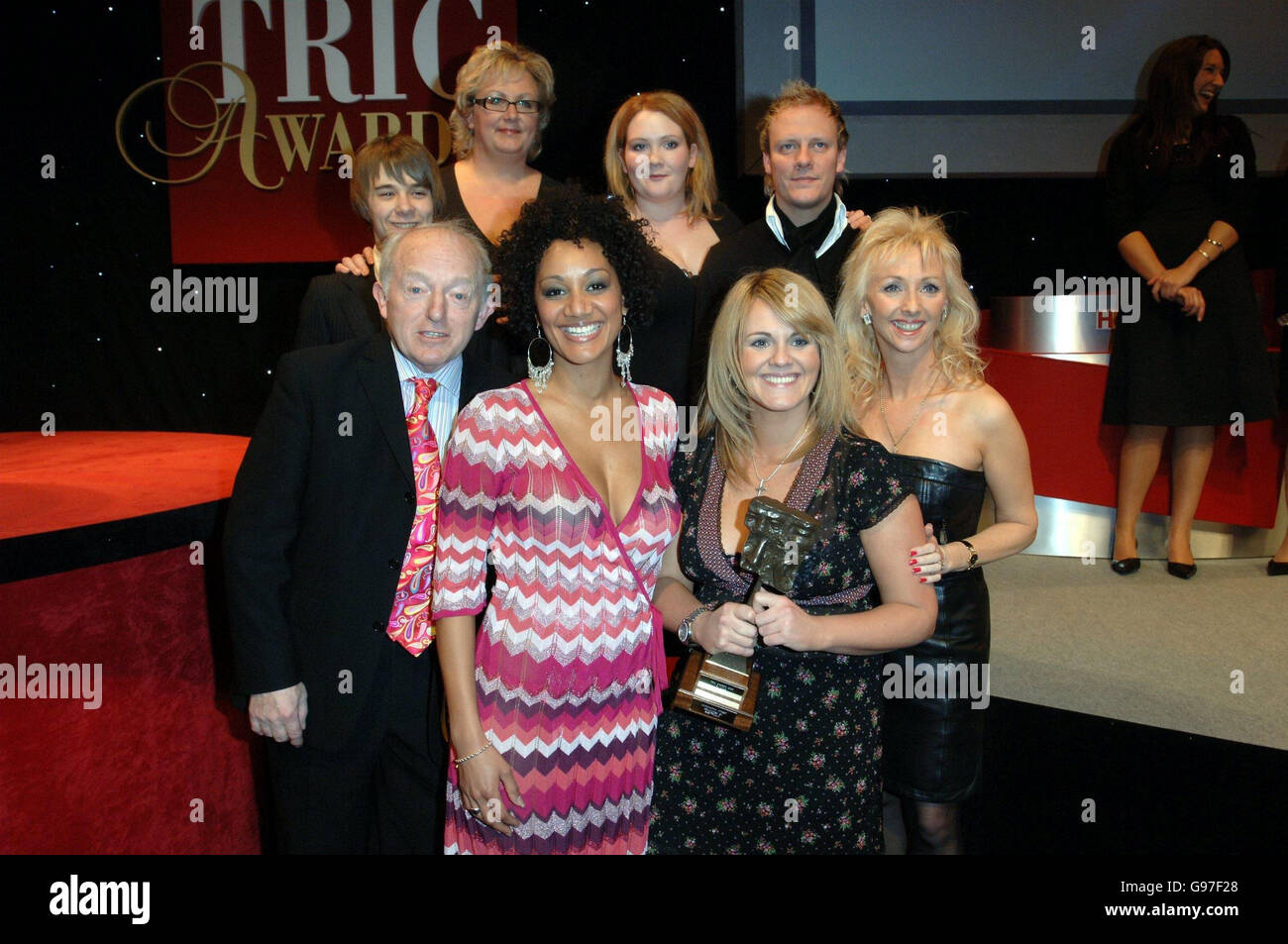 Members of the cast of Coronation Street (Back, Left to Right) Jack Shepherd, Sue Cleaver, Jennie McAlpine, and Antony Cotton, with Tupele Dorgu (Front, second left) and Sally Lindsay (front, second right) receive the award for TV Soap of the Year from Paul Daniels (front left) and Debbie McGee (front, right), during the Television and Radio Industries Club (TRIC) Awards, at Grosvenor House, central London, Tuesday 7 March 2006. The awards honour performers and programmes and are voted for by radio and television personnel. PRESS ASSOCIATION Photo. Photo credit should read: Steve Parsons/PA Stock Photo