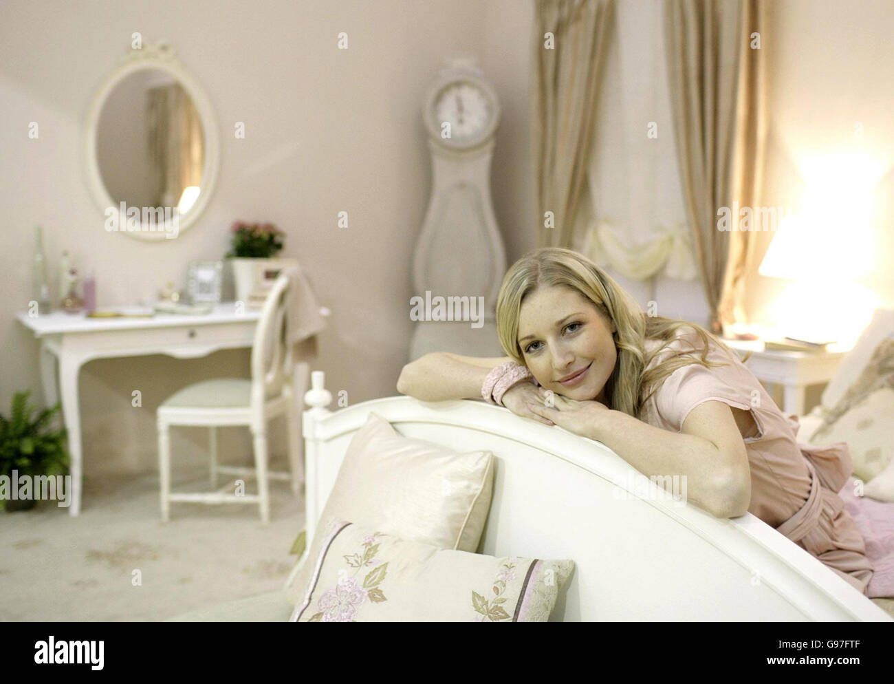 Model Natalie in the "Pink Room", one of six room sets that TV's