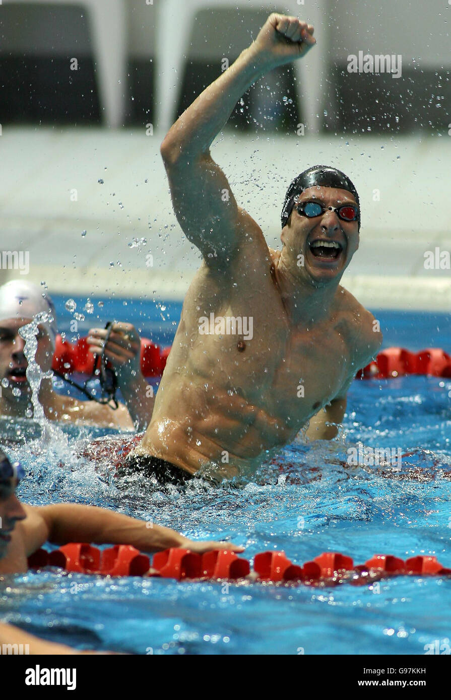 England's Christopher Cook celebrates winning gold in the Men's 50 metres Breaststroke Final at the Melbourne Sports and Aquatic Centre (MSAC), during the 18th Commonwealth Games in Melbourne, Australia, Monday March 20, 2006. See PA story COMMONWEALTH Swimming. PRESS ASSOCIATION Photo. Photo credit should read: Gareth Copley/PA. Stock Photo