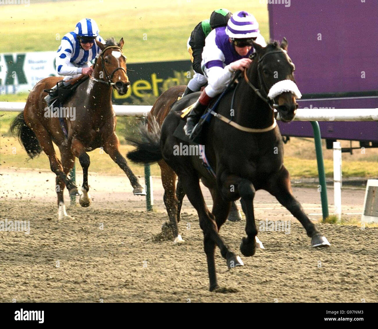 Kalankari ridden by jockey Martin Dwyer (R) on the way to winning in