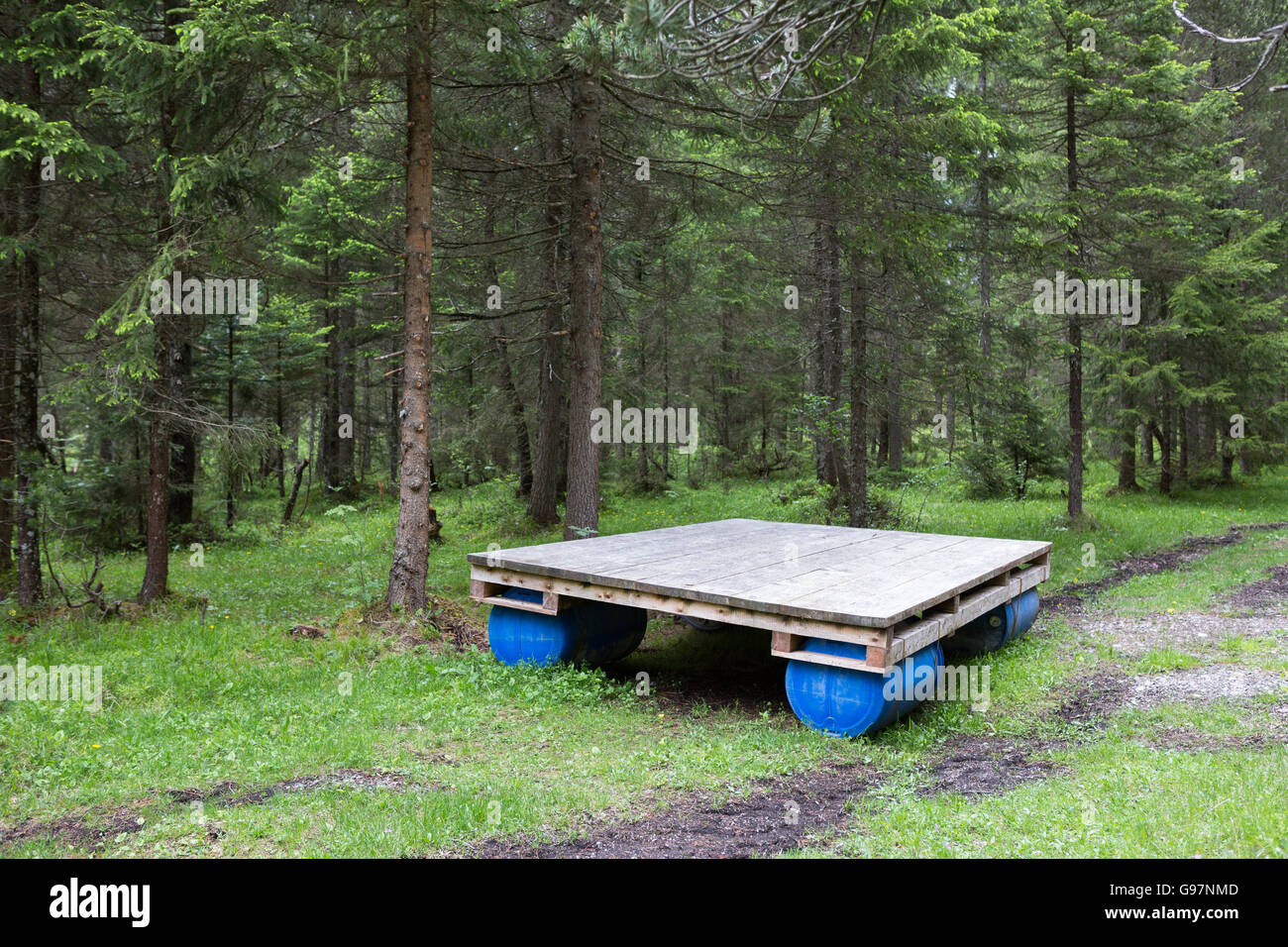 A raft abandoned in a forest Stock Photo