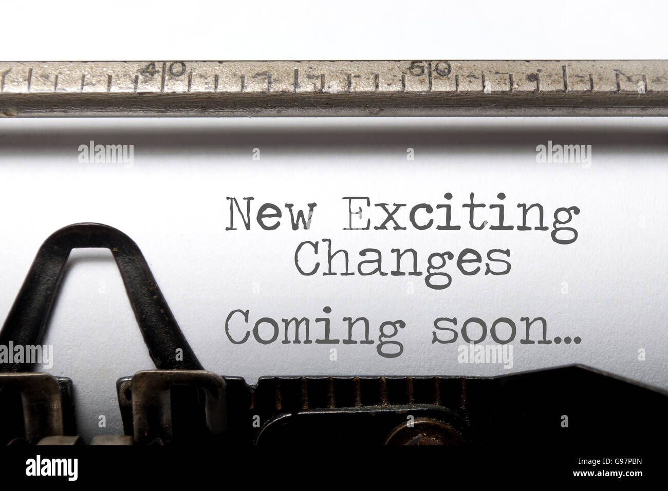 Exciting changes coming soon motivational saying printed on an old