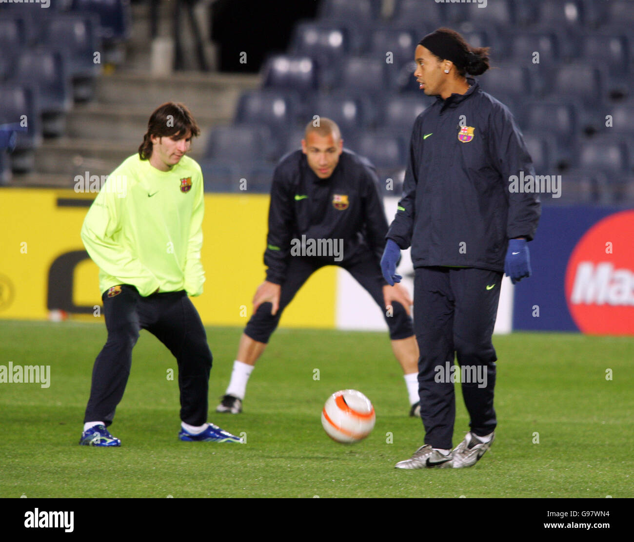 Barcelonas lionel messi and ronaldinho in their training session hires