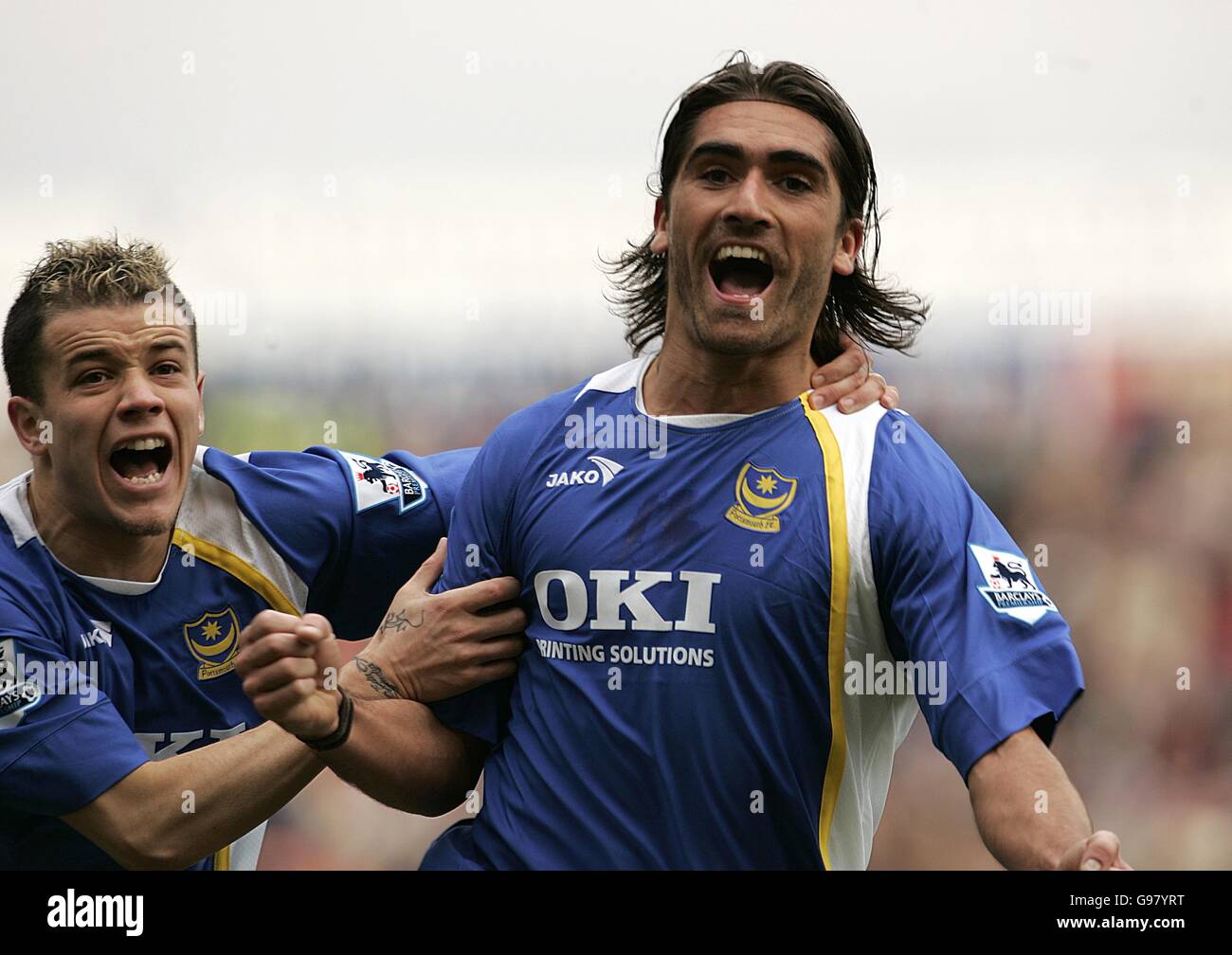 Portsmouth's Miguel Pedro Mendes celebrates scoring the opening goal with Andres D'Alessandro Stock Photo