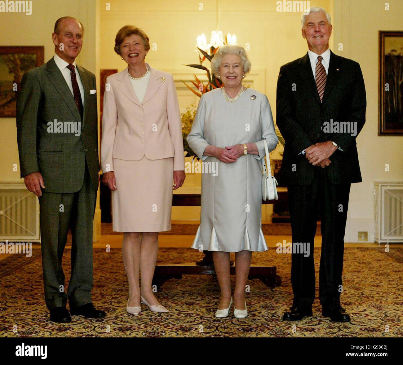 Queen Elizabeth II (second right) and the Duke of Edinburgh (left) pose for a photograph with the Australian Governor General Michael Jeffrey and his wife, Marlena, before lunch during a visit to Government House in Canberra Tuesday March 14, 2006 as part of the Royal couple's five day tour of the country. See PA story ROYAL Queen. PRESS ASSOCIATION Photo. Photo credit should read: Gareth Fuller / PA. Stock Photo