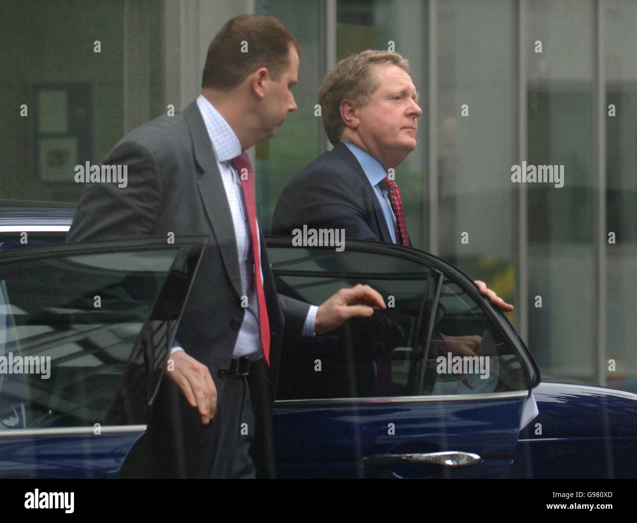 Metropolitan Police Commissioner Sir Ian Blair (right) alights from his