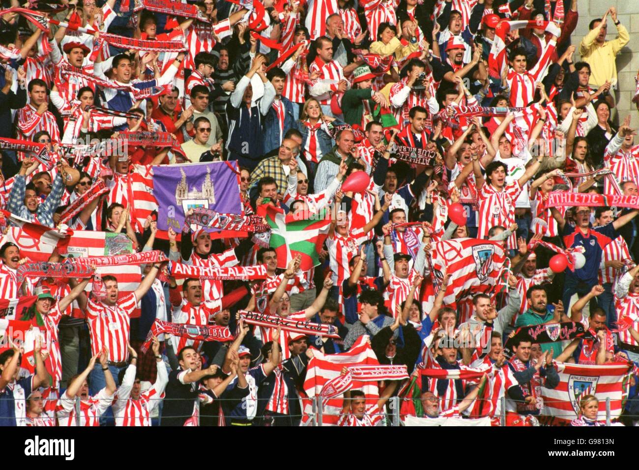 Fan crowd replica shirt scarf flag basque football hires stock