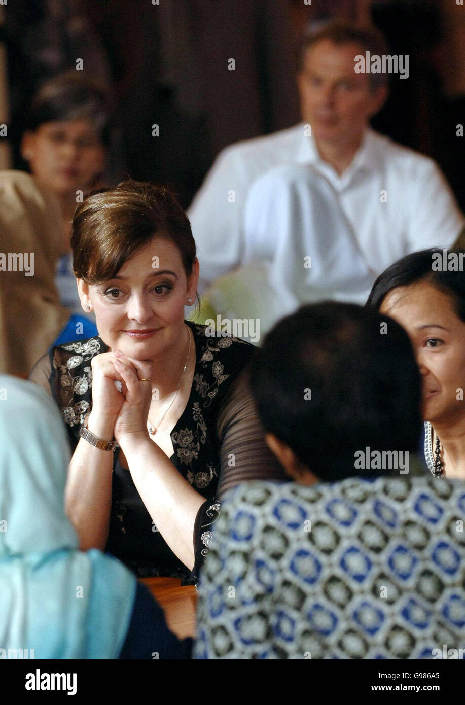 Britain's Prime Minister Tony Blair and wife Cherie meet widows of the tsunami disaster and the civil war in Aceh province, Indonesia, Thursday March 30, 2006. Mr Blair today pledged to work more closely with the world's largest Muslim country in the fight against terrorism but Indonesian Muslim leaders told him his policies were breeding extremism. Mr Blair, accompanied by his wife Cherie, touched down in the capital Jakarta last night on the last leg of a marathon seven-day diplomatic mission. See PA story POLITICS Blair. PRESS ASSOCIATION photo. Photo credit should read: Stefan Rousseau/PA. Stock Photo