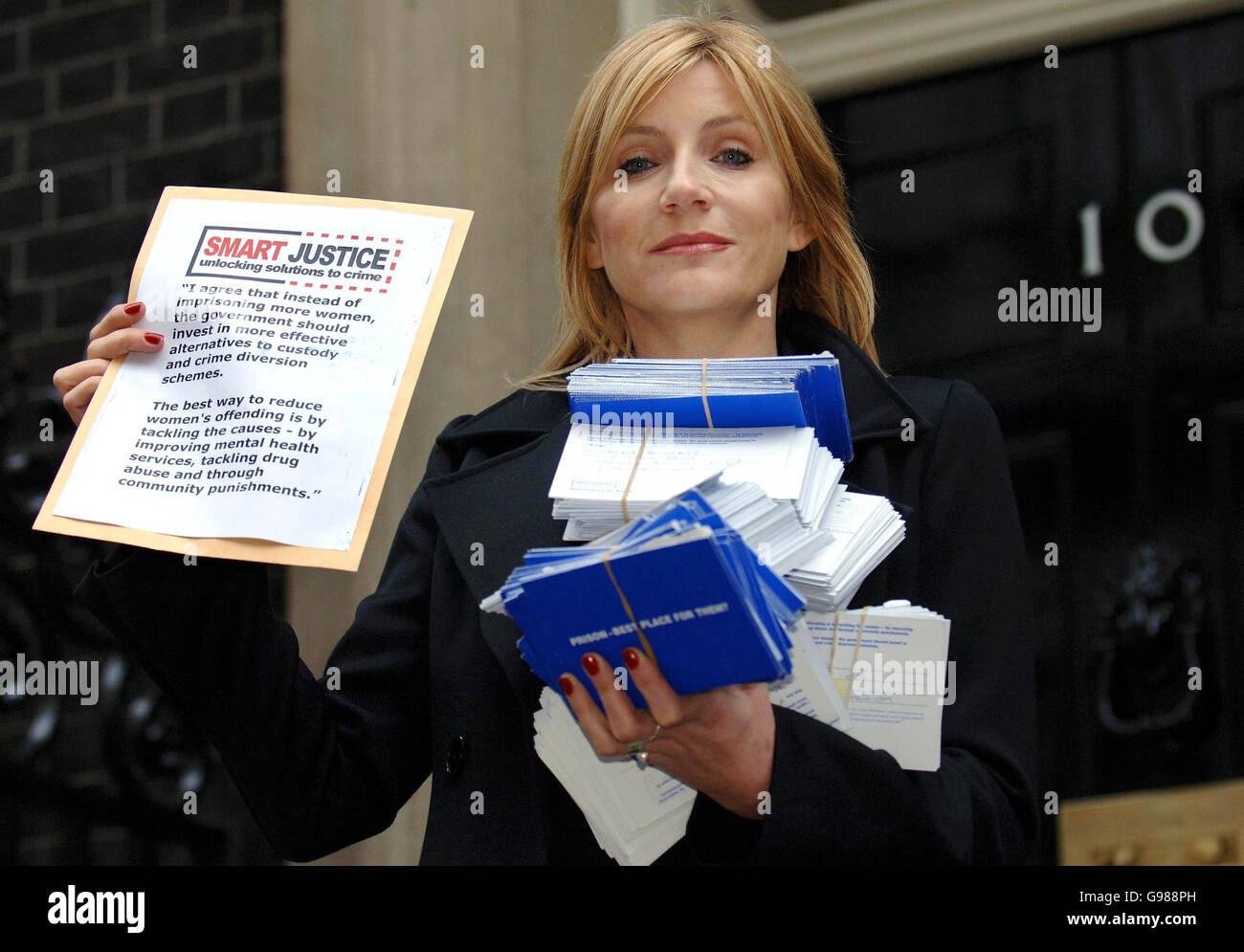 Actress Michelle Collins arrives at 10 Downing Street, London, Monday March 6 2006 with petition cards from Smart Justice. The campaign group is calling on the Government to find alternatives to prison - such as mental health treatment and drug rehabilitation programmes - for vulnerable women convicted of non-violent offences. Watch for PA story. PRESS ASSOCIATION photo. Picture credit should read: Fiona Hanson/PA. Stock Photo