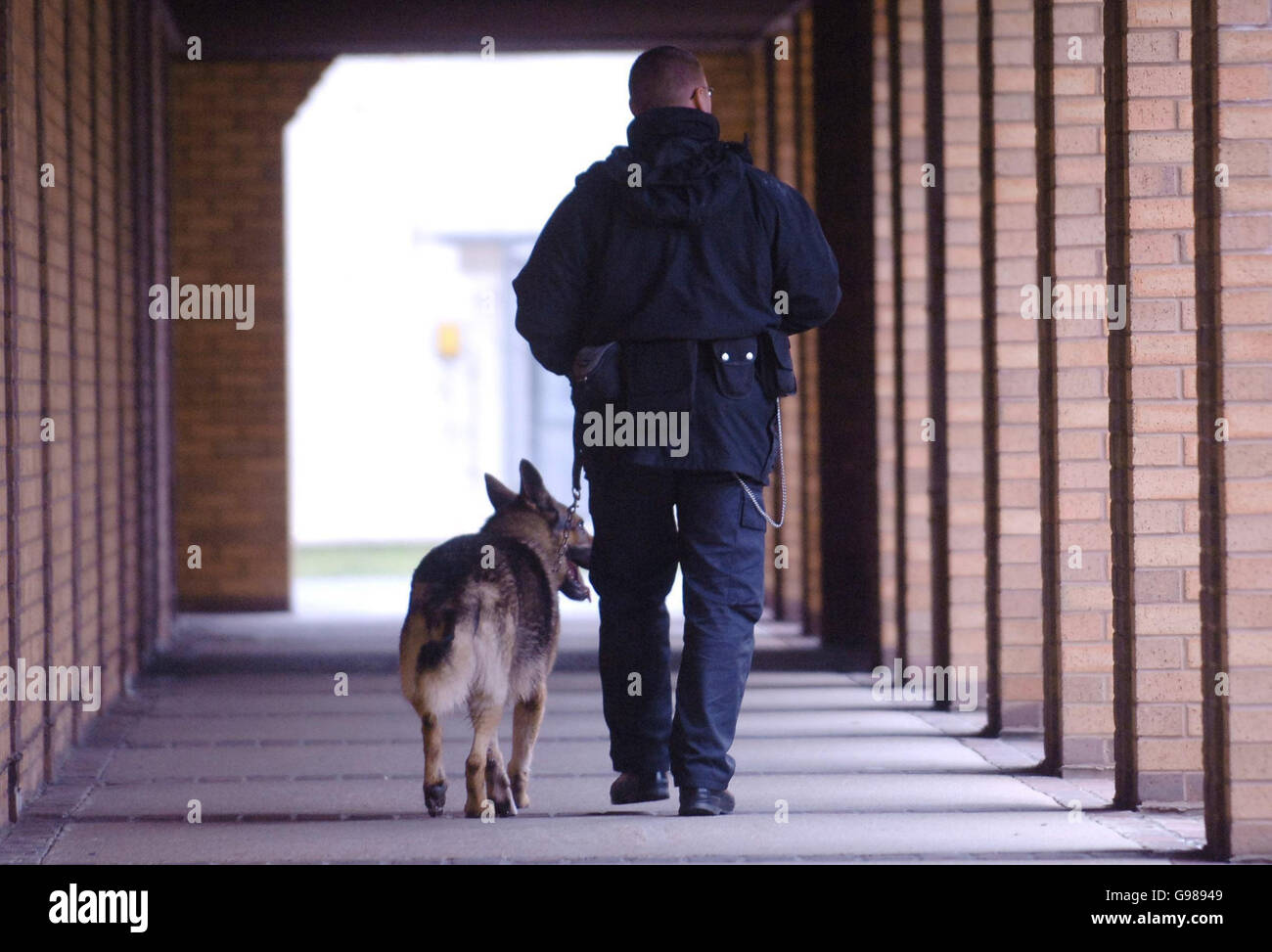 A prison dog handler at Belmarsh maximum security jail in south east London, Tuesday March 7