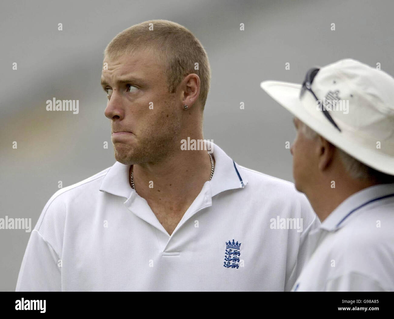 England captain Andrew Flintoff (L) with coach Duncan Fletcher before the first day of the second Test match against India at the PCA Stadium, Mohali, India, Thursday March 9, 2006. PRESS ASSOCIATION Photo. Photo credit should read: Rebecca Naden/PA. Stock Photo