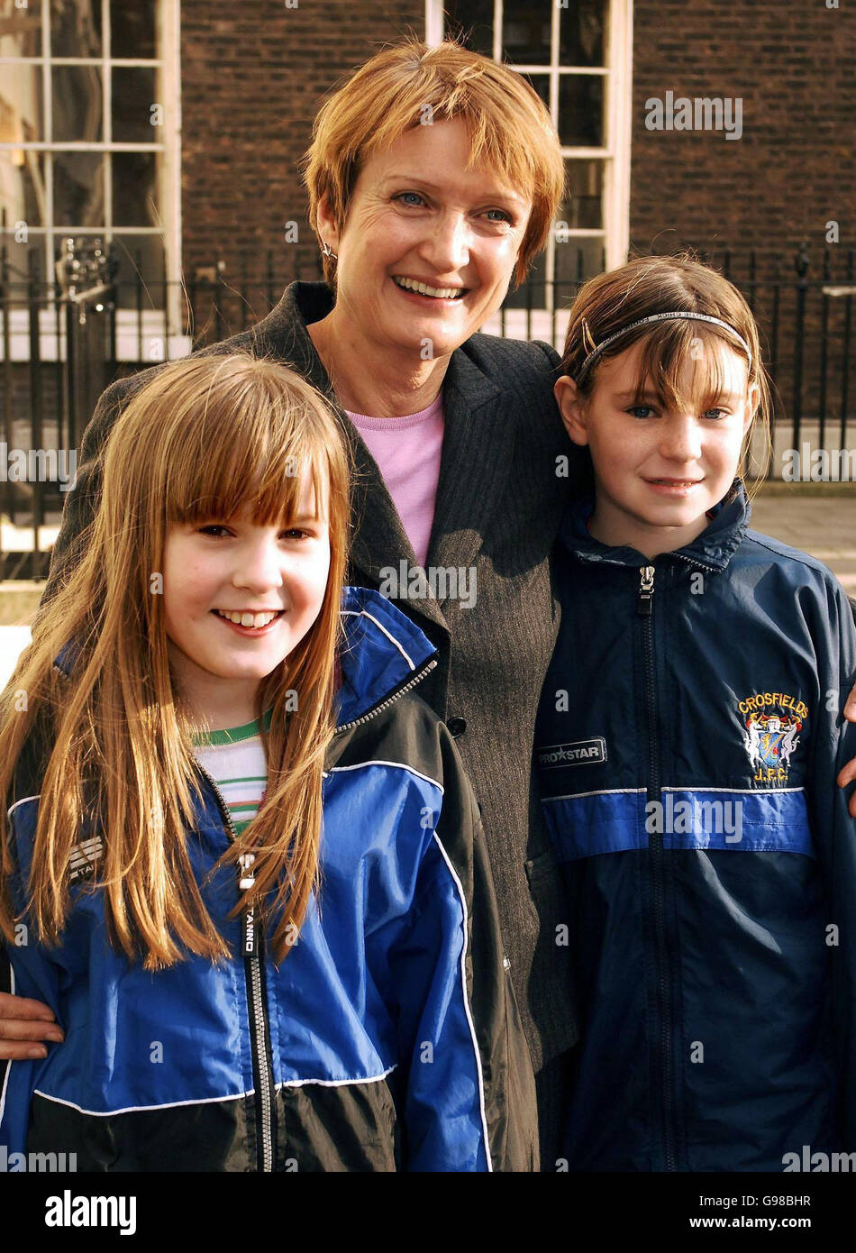 Minnie Cruttwell (left) aged 11 from South London, with Tessa Jowell the Minister for Culture Sport and Media, and Hannah Dale (right) aged 11 from Warrington Cheshire, at the Football Association Headquaters in Central London, Monday 13 vMarch 2005. The three were at the FA to clarify their position on girls continuing to play with their boys team, after Minnie wrote a letter to the Minister for sport wanting to know why she was unable to continue to play with her boys team the 'Balham Blazers' because of the FA rules which stated that after turning 12 she must play in an all girls team. Stock Photo