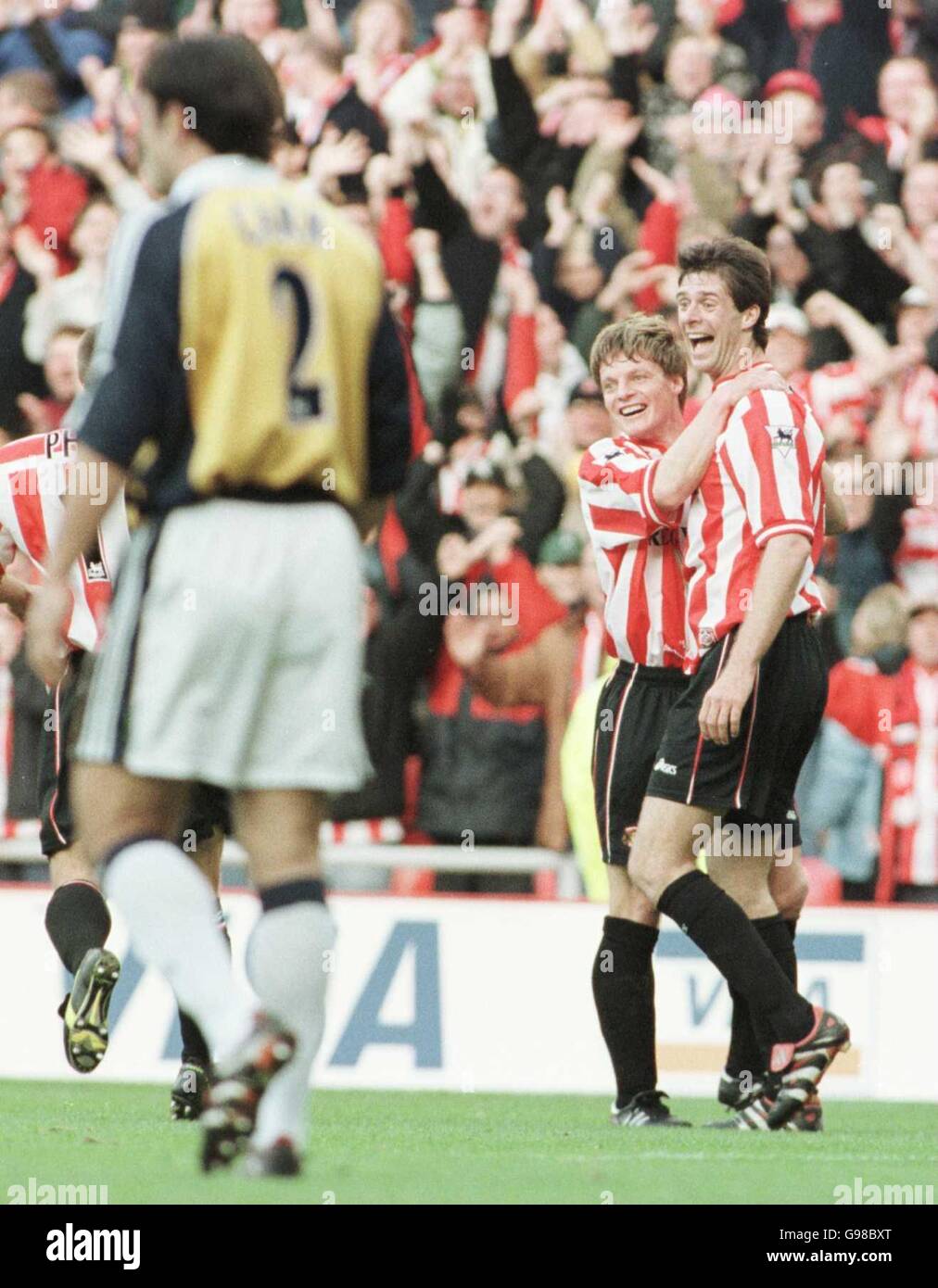 Sunderland's Niall Quinn celebrates after scoring his second goal Stock Photo
