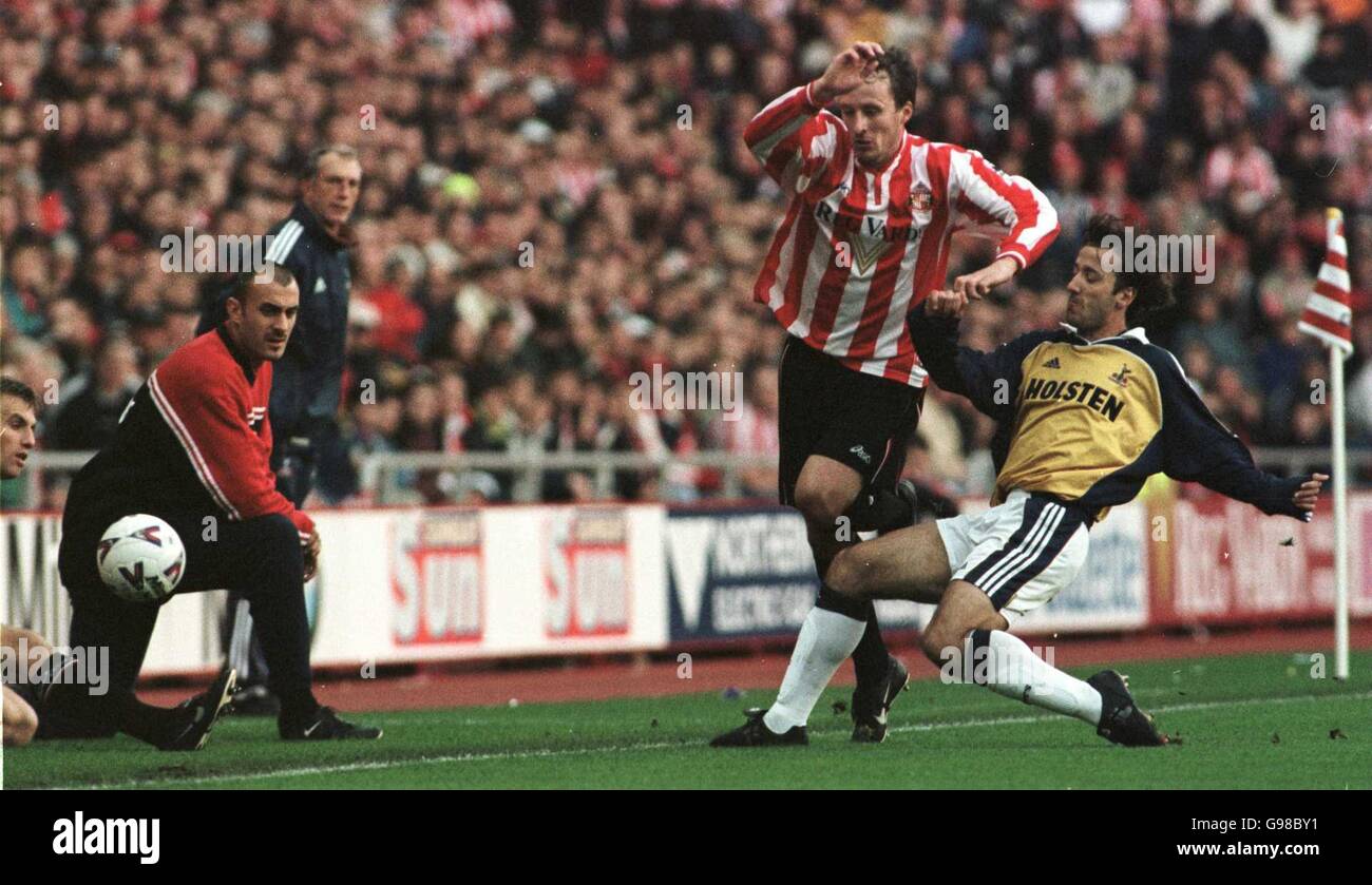 Soccer - FA Carling Premiership - Sunderland v Tottenham Hotspur. Sunderland's Nicky Summerbee has his legs taken by Tottenham Hotspur's Maurico Taurico Stock Photo