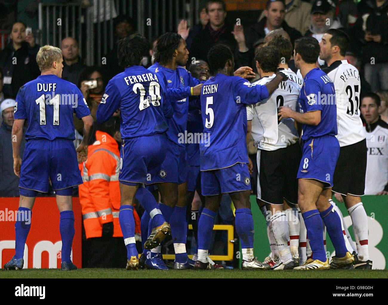 PA library file dated 19/03/2006 of Chelsea and Fulham players involved in a heated confrontation following a foul by Chelsea's William Gallas. Chelsea have been charged by the Football Association with failing to control their players for the second time in 15 days, Thursday March 23, 2006. The new charge relates to their conduct following the sending-off of William Gallas late on in last Sunday's match against Fulham. See PA story SOCCER Discipline Chelsea. PRESS ASSOCIATION Photo. Photo credit should read: Nick Potts/PA. Stock Photo