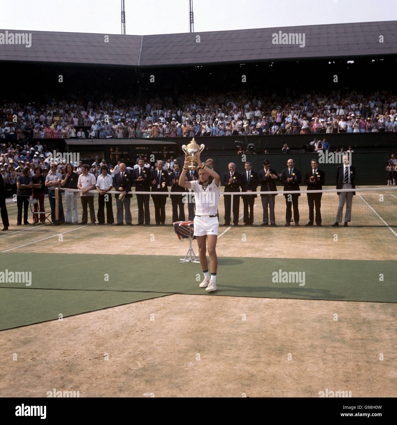 Tennis - Wimbledon Championships - Men's Singles - Final - Bjorn Borg v Ilie Nastase - The All England Club. Bjorn Borg lifts the men's singles trophy aloft after his straight sets victory Stock Photo