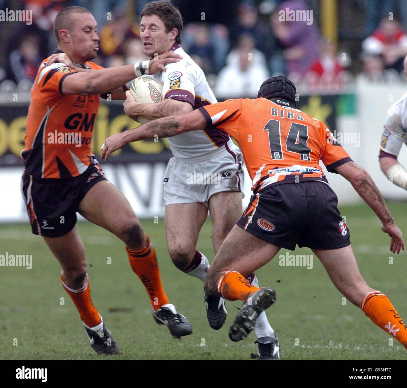 Huddersfield Giants' Chris Thorman is stopped by Castleford Tigers' Matt Whittaker and Deon Bird during the Engage Super League match at The Jungle, Castleford, Sunday March 26, 2006. PRESS ASSOCIATION Photo. Photo credit should read: PA. **** Stock Photo