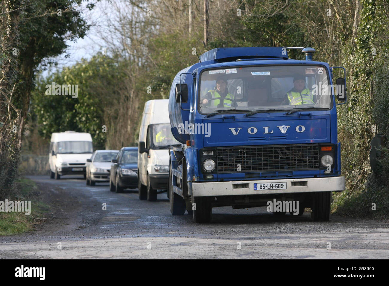 Garda officers drive fuel tankers from the scene of a major cross border search operation Near Crossmaglen in Co Armagh, Thursday March 9 2006. Three people were arrested during a massive security operation linked to a major investigation into organised crime on both sides of the Irish border today. Hundreds of police and soldiers in south Armagh and north Co Louth raided properties and at one stage an area around the family home of Thomas 'Slab' Murphy, 62, allegedly the IRA's one-time Chief of Staff, was sealed off. PRESS ASSOCIATION Photo. Photo credit should read: Niall Carson/PA Stock Photo