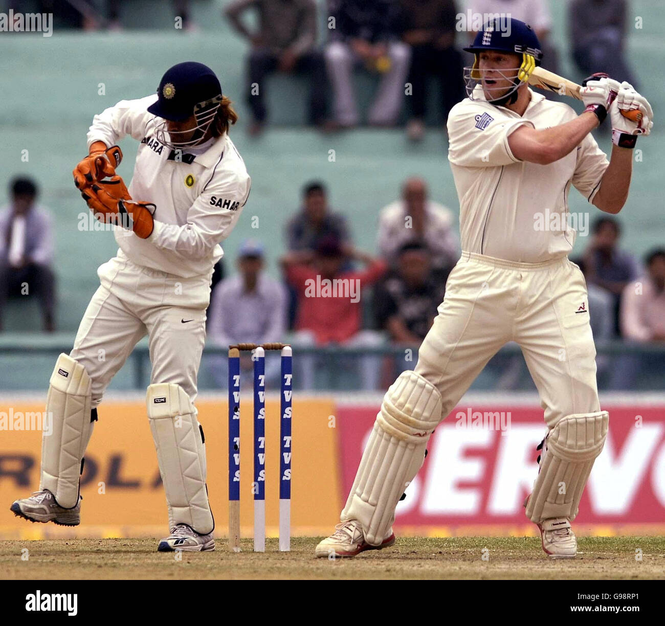 England captain Andrew Flintoff (R) in action during the second day of the second Test match against India at the PCA Stadium, Mohali, India, Friday March 10, 2006. PRESS ASSOCIATION Photo. Photo credit should read: Rebecca Naden/PA. Stock Photo