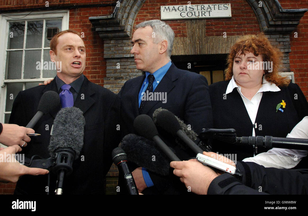 Yvonne and Jim Collinson, with their barrister John Cooper (centre) outside Epsom Magistrates' Court, Friday March 10, 2006, where a jury delivered an open verdict today on the death of their son, Private James Collinson. Private Collinson, 17, from Perth, was found dead with a single gunshot wound to his head close to the perimeter fence of the Deepcut army barracks in Surrey where he had been on guard duty on the night of March 23, 2002. See PA story INQUEST Deepcut. PRESS ASSOCIATION photo. Photo Credit should read: Fiona Hanson/PA. Stock Photo