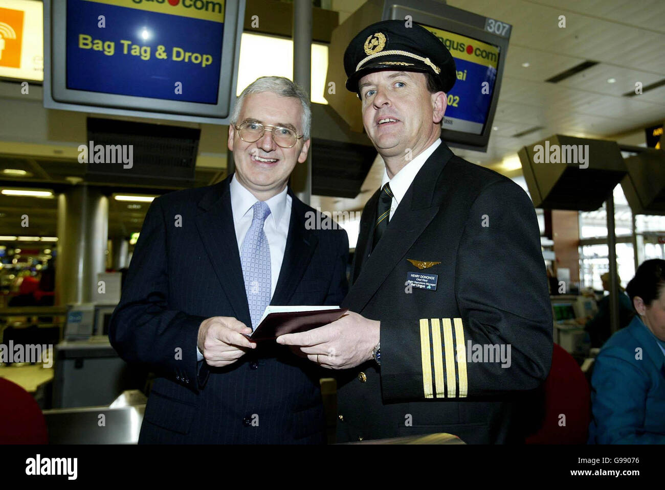 Aer Lingus Chief executive Dermot Mannion (left) and Chief Pilot Henry Donohue at Dublin Airport, Tuesday 28 March 2006 as Aer Lingus made history today with its first long-haul eastern flight to Dubai. Launching the new thrice-weekly service, Transport Minister Martin Cullen said it marked a new era in the state airline's growth and development as it embraces privatisation. Dubai is the first eastern-bound and non-US long-haul route in the history of Aer Lingus, which aims to carry 70,000 passengers on the seven-hour flight over the next 12 months. See PA Story AIR Dubai. PRESS ASSOCIATION Stock Photo