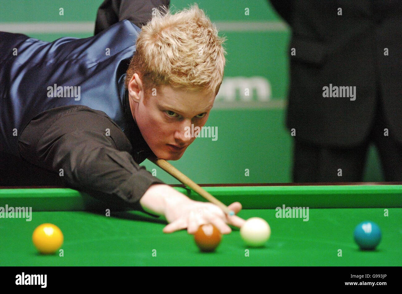 Neil Robertson in action against Paul Hunter during the first round of the World Snooker Championship at The Crucible Theatre, Sheffield. Stock Photo