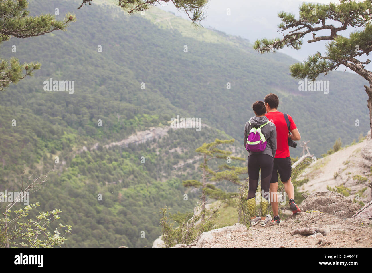 Attractive young couple hikers hi-res stock photography and images - Alamy