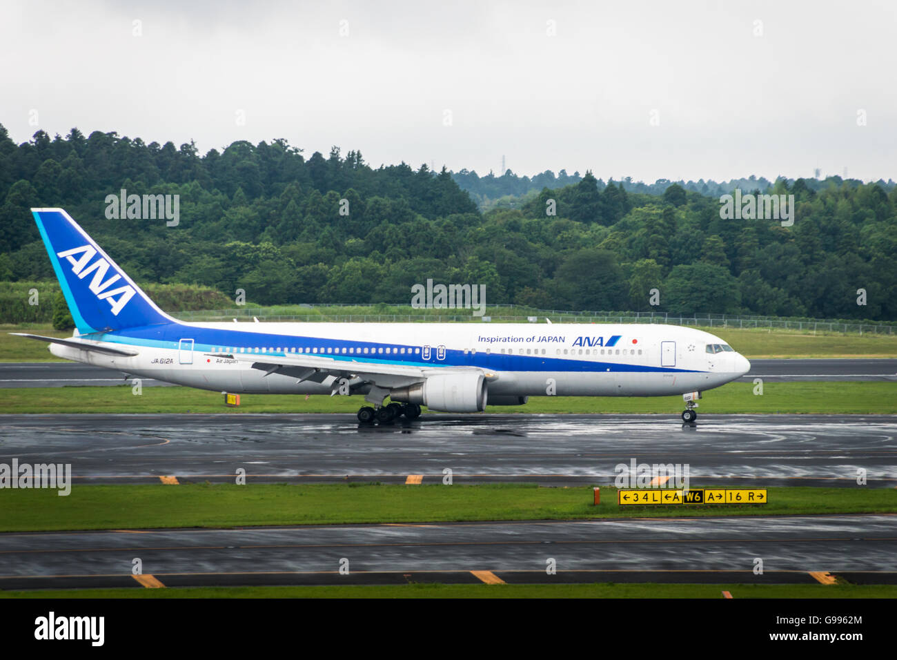ANA aircraft - Boeing 767-381 - taxing at Narita International Airport Stock Photo