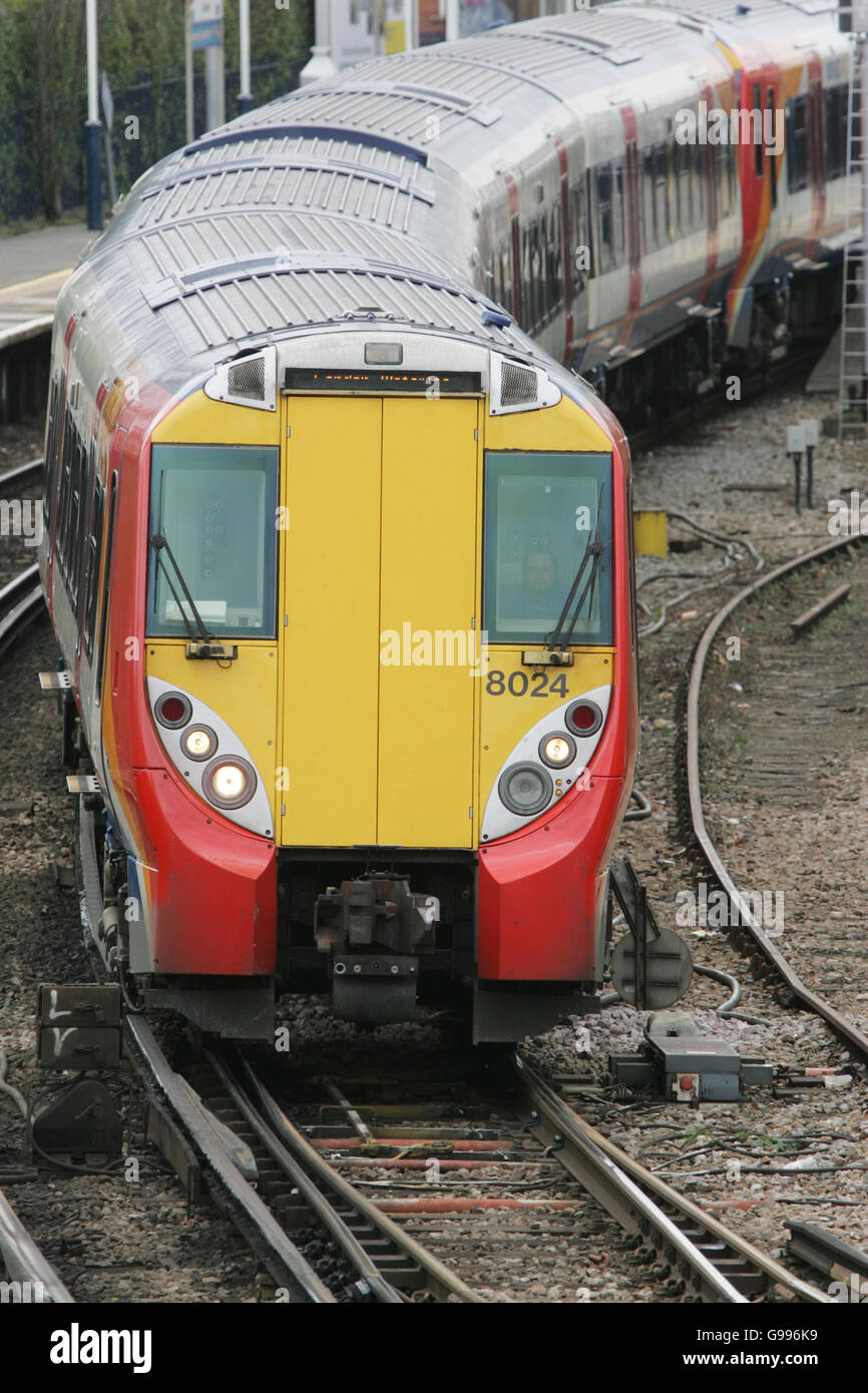 A South West Trains Class 458 Multiple Unit Electric train on the line between London and Staines. Stock Photo