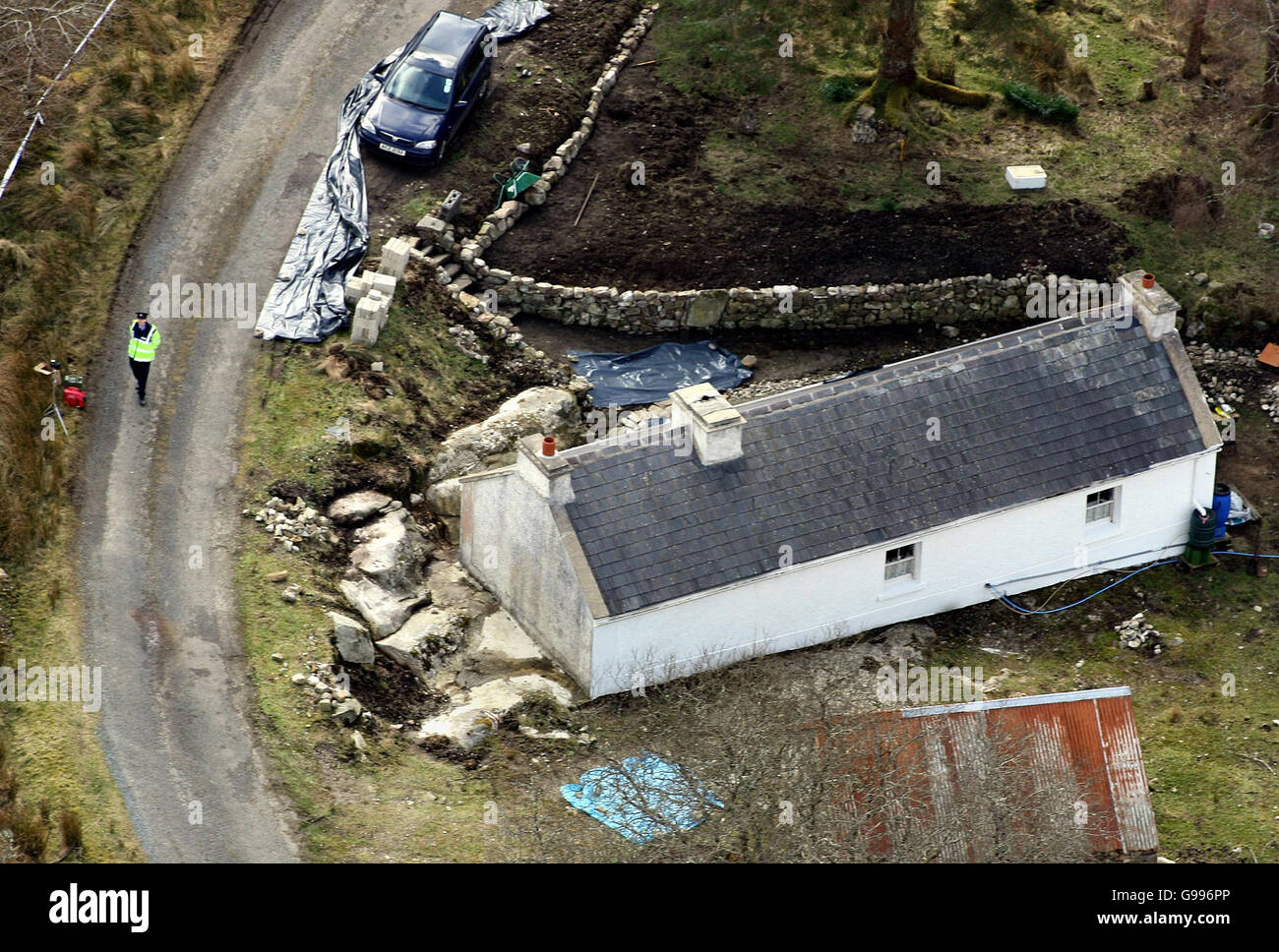 An aerial view Wednesday April 5, 2006, of the dilapidated house near the village of Glenties, Co Donegal, where former Sinn Fein member and British spy Denis Donaldson lived and was murdered Tuesday. Last year Mr Donaldson admitted that he had spied on his colleagues in the republican movement for two decades after being compromised at a vulnerable time in his life. See PA story ULSTER Donaldson. PRESS ASSOCIATION Photo. Photo credit should read: Paul Faith / PA. Stock Photo
