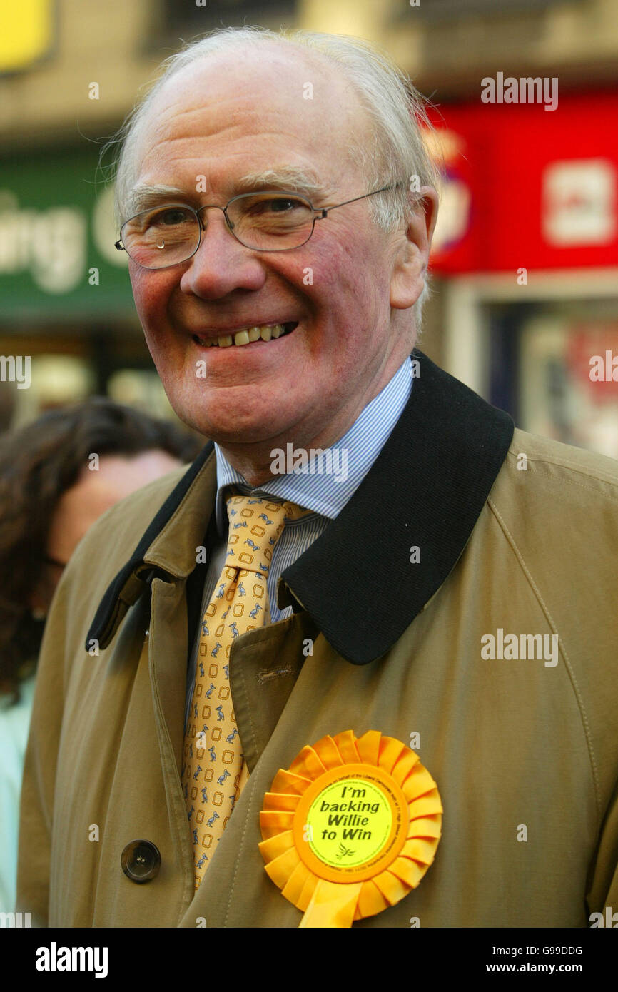 Liberal Democrat leadership contender Sir Menzies Campbell arrives in Dunfermline High Street, after Willie Rennie, the triumphant new Liberal Democrat MP for Dunfermline and West Fife, said his shock by-election victory would 'rock the foundations of Downing Street - and I mean both No 10 and No 11'. The foundations are probably safe. But in the top floor flats there may have been some furrowed brows in the early hours of this morning. Stock Photo