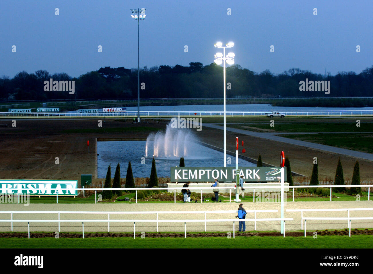 The floodlights shine on the finishing line at kempton park hires