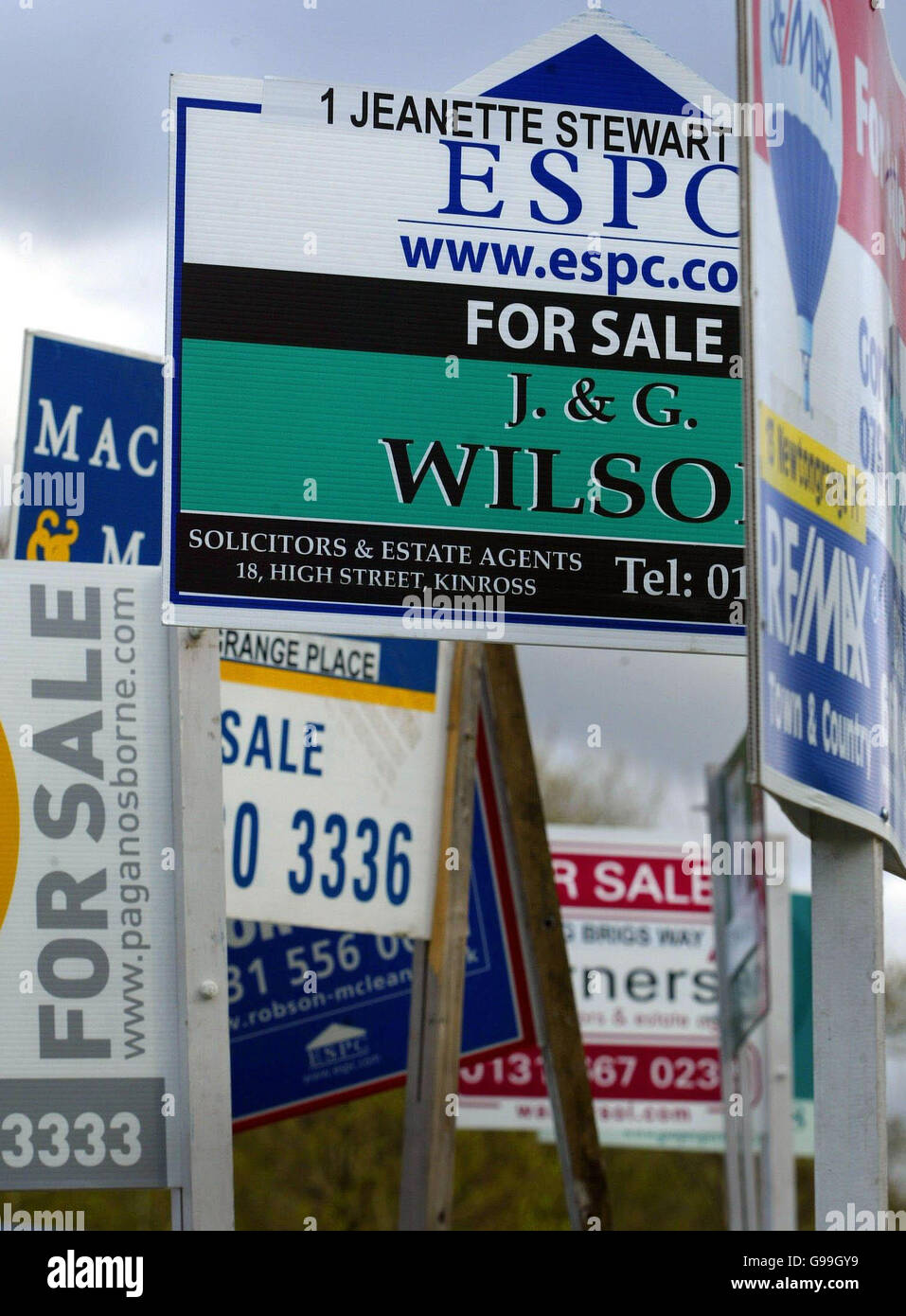 For sale signs outside homes in a street in Loanhead near Edinburgh