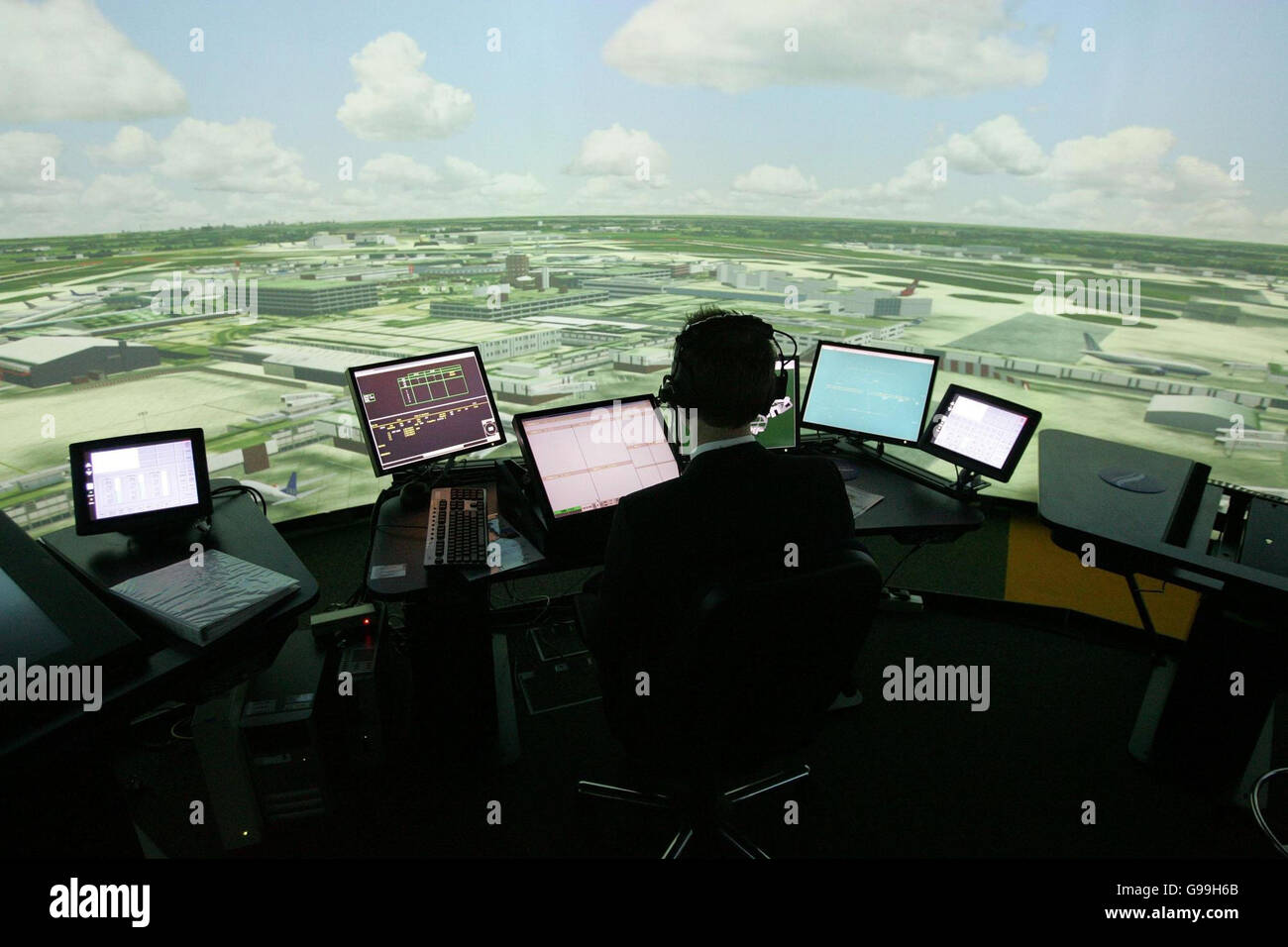 Dale Reeson, an Air Traffic Controller sits in the new 360 degree Heathrow Control Tower Simulator in the Air Traffic Control Tower at Heathrow Airport. Stock Photo