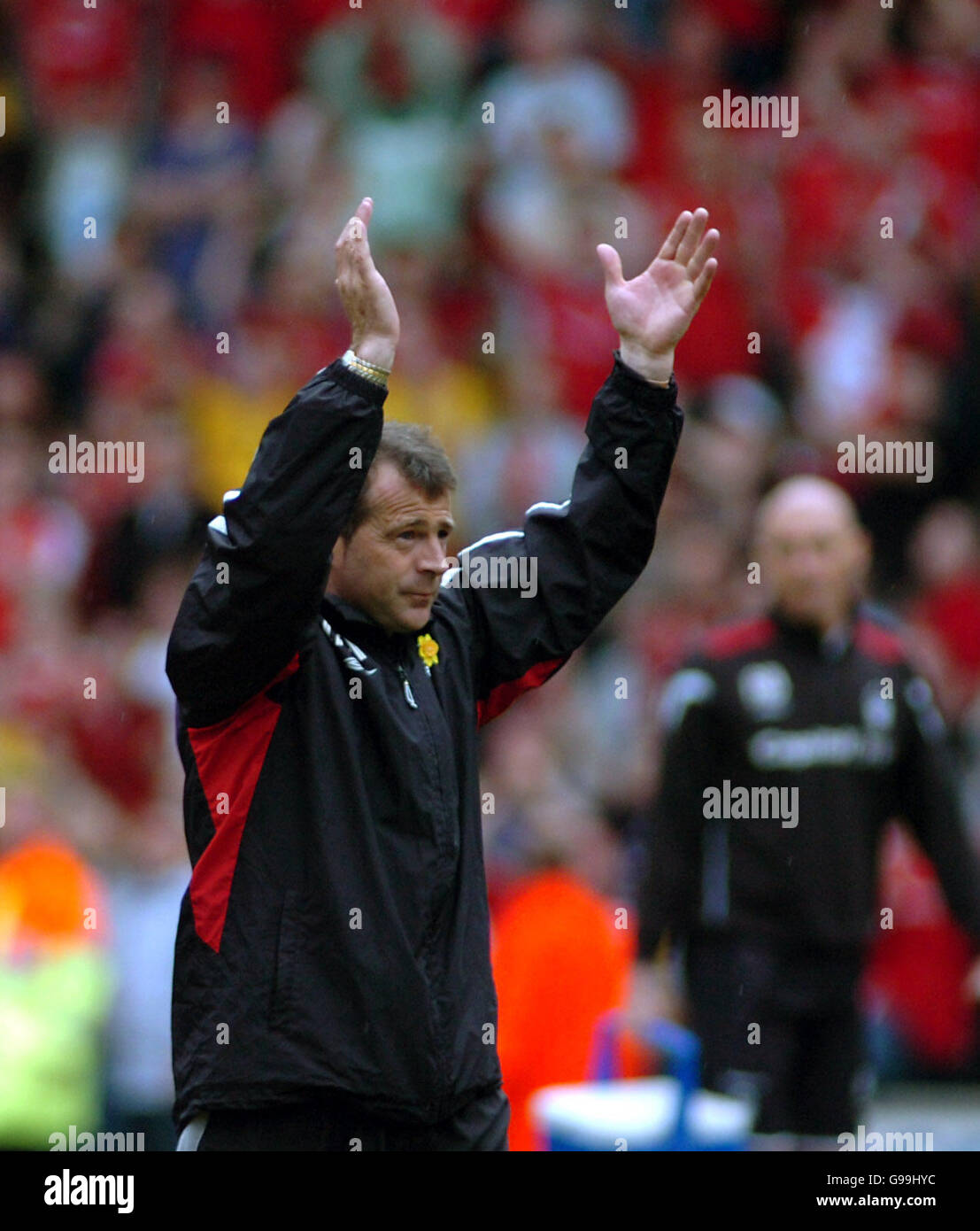 Nottingham Forest's caretaker manager Ian McParland applauds the away